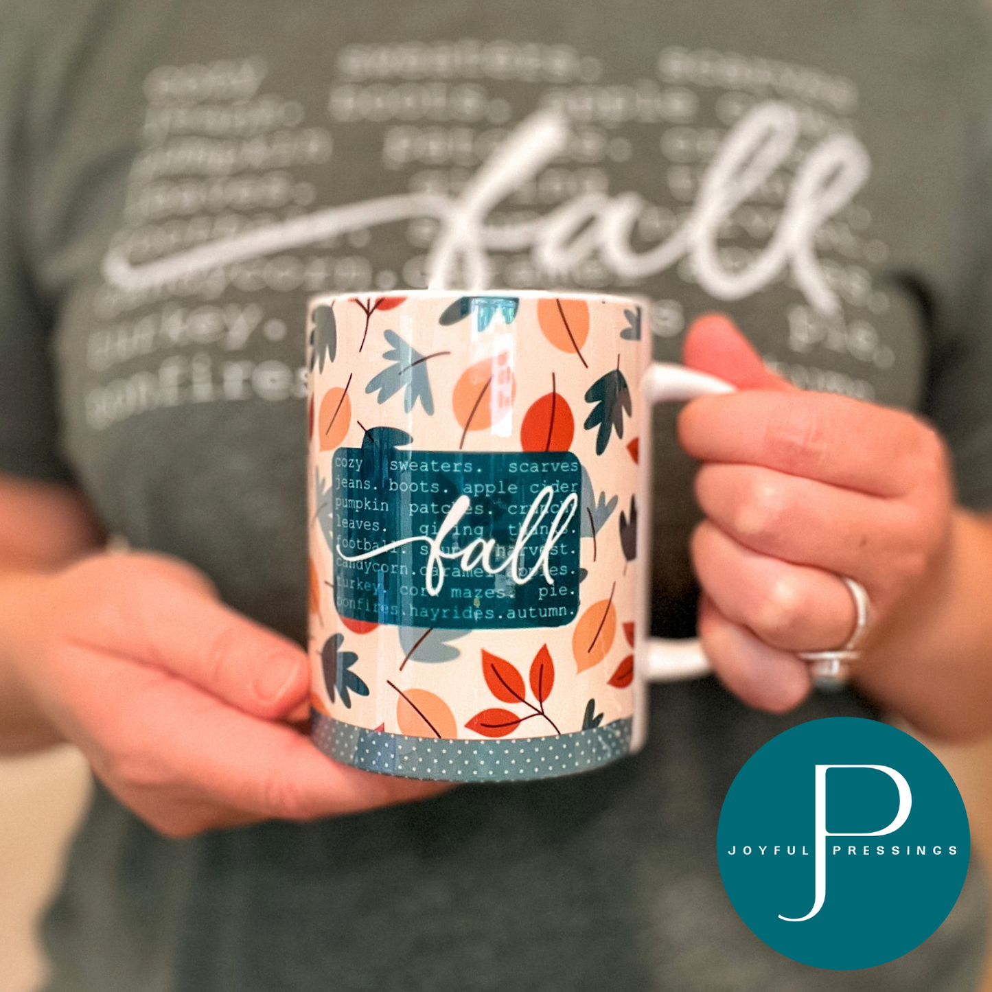 picture of model holding fall mug