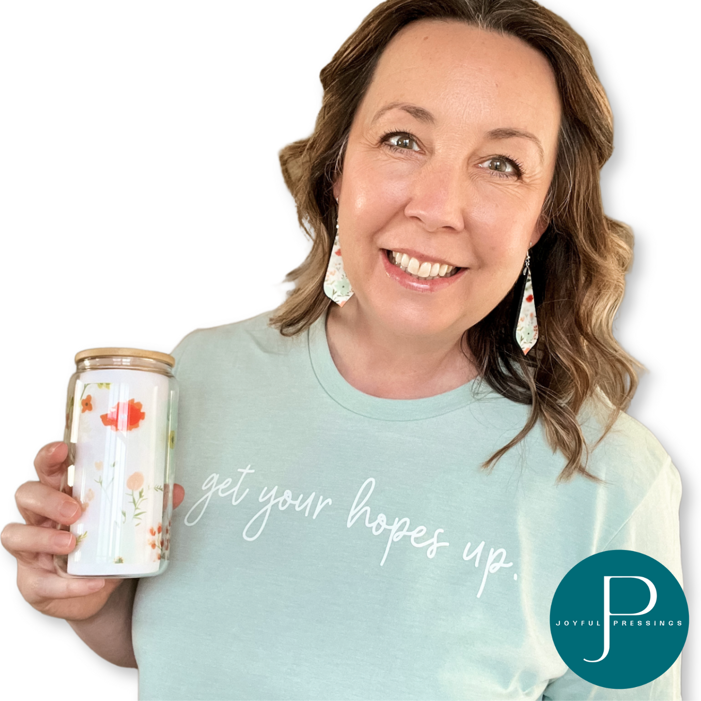 Model showcasing Get Your Hopes Up bundle.  Includes Get Your Hopes Up t-shirt, matching earrings, and glass tumbler.