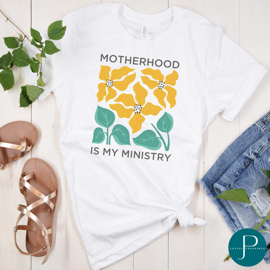 Motherhood is My Ministry graphic on a white tee.