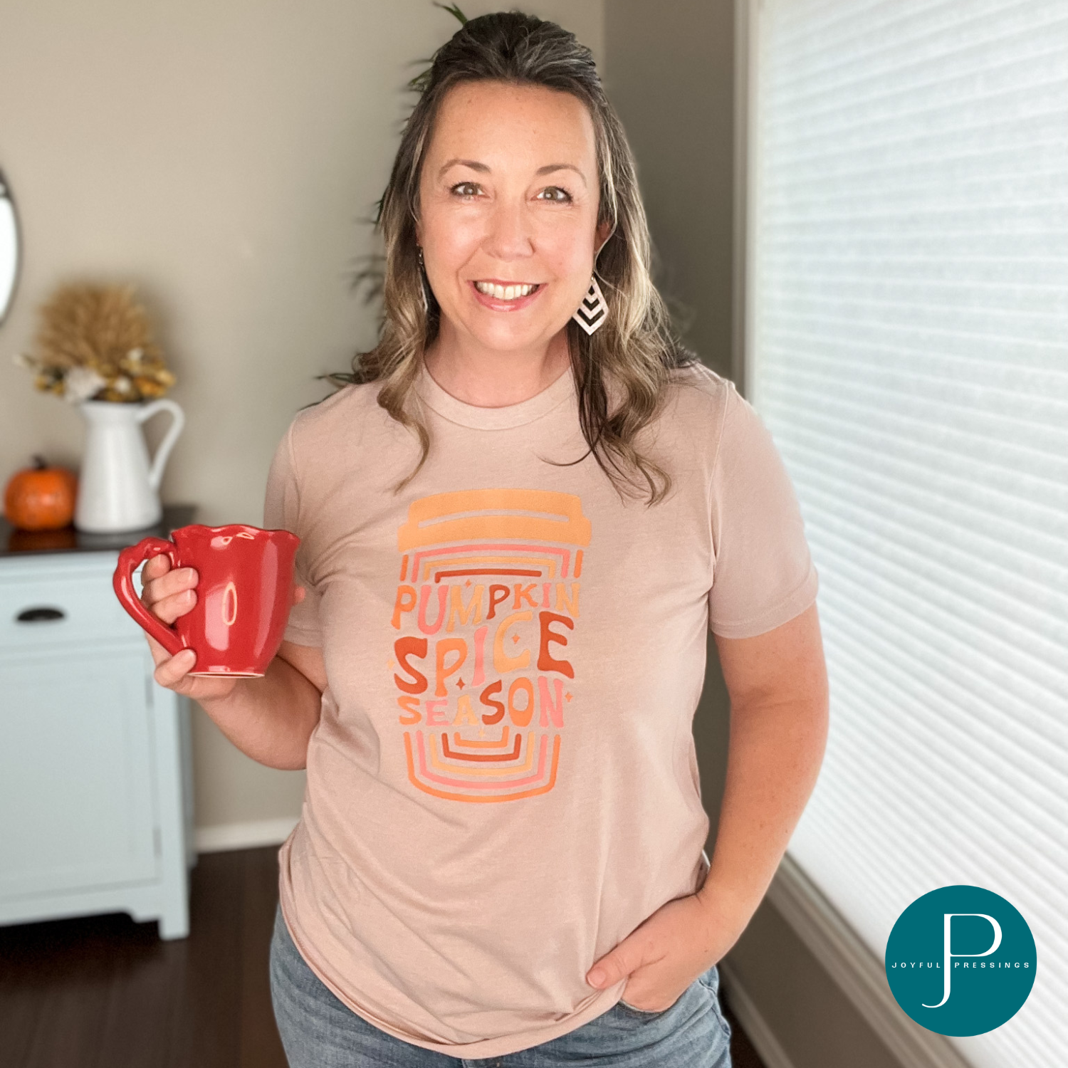 Model wearing Pumpkin Spice Season tee.