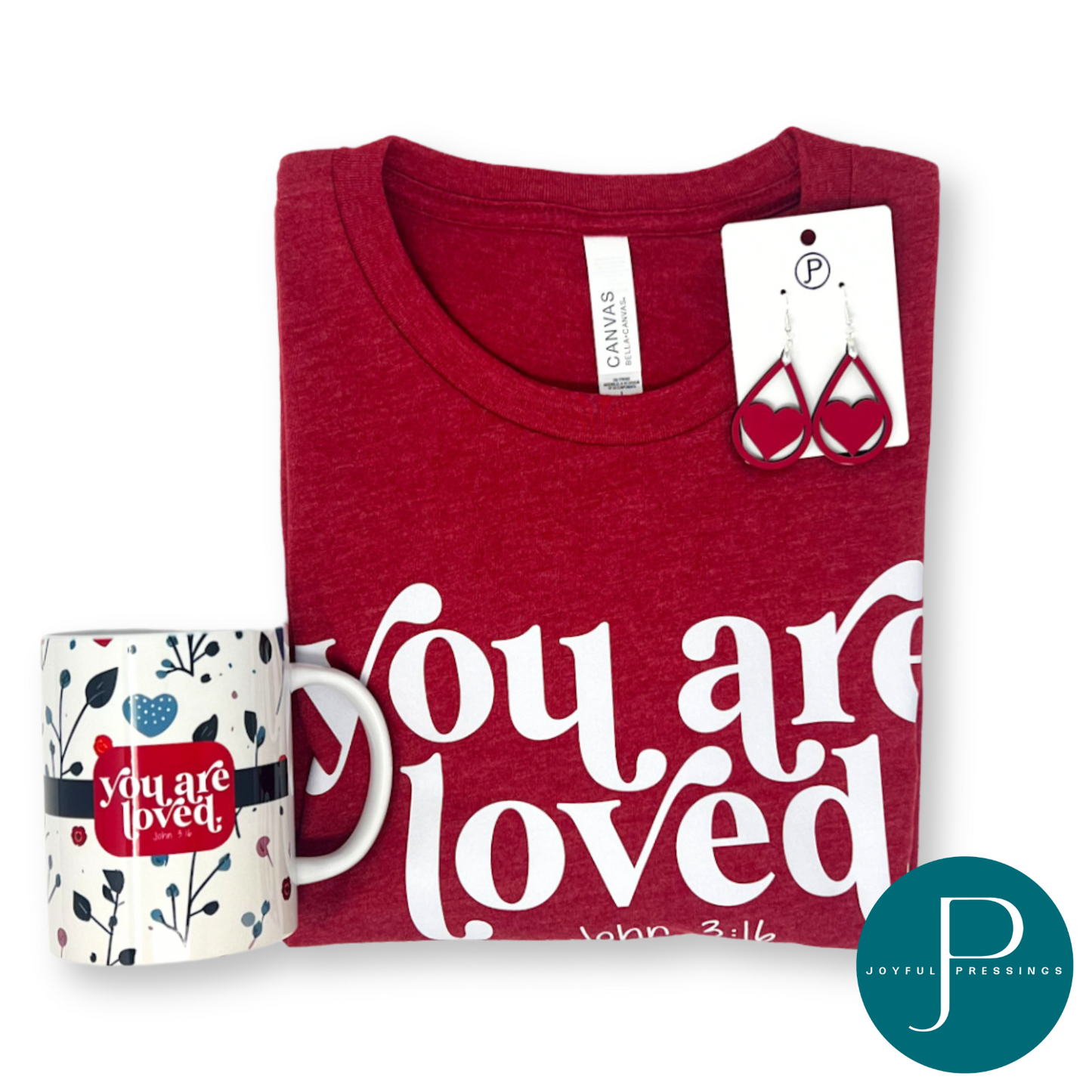 product display of the you are loved bundle including shirt, earrings and matching mug