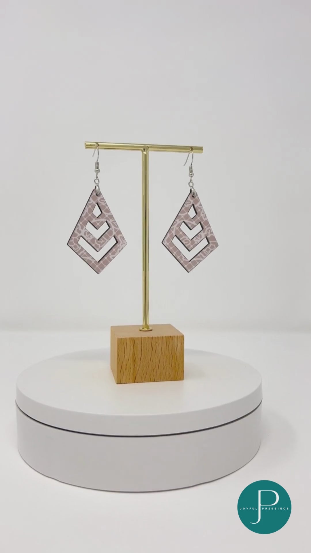 video of light pink lace macrame earrings.